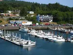 Depoe Bay is on the Oregon coast, a little village that's noted for whale-watching, for its spouting horns and has the smallest navigable harbor in the world.