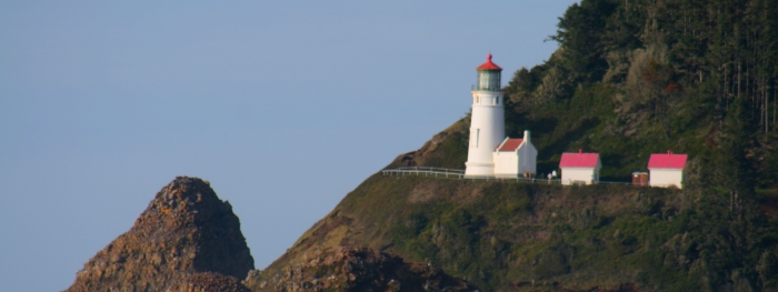The Heceta Head Lighthouse, seen from the Sea Lion Caves in Florence, Oregon