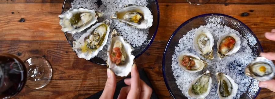Enjoying fresh local oysters at Humboldt Bay Provisions in Eureka