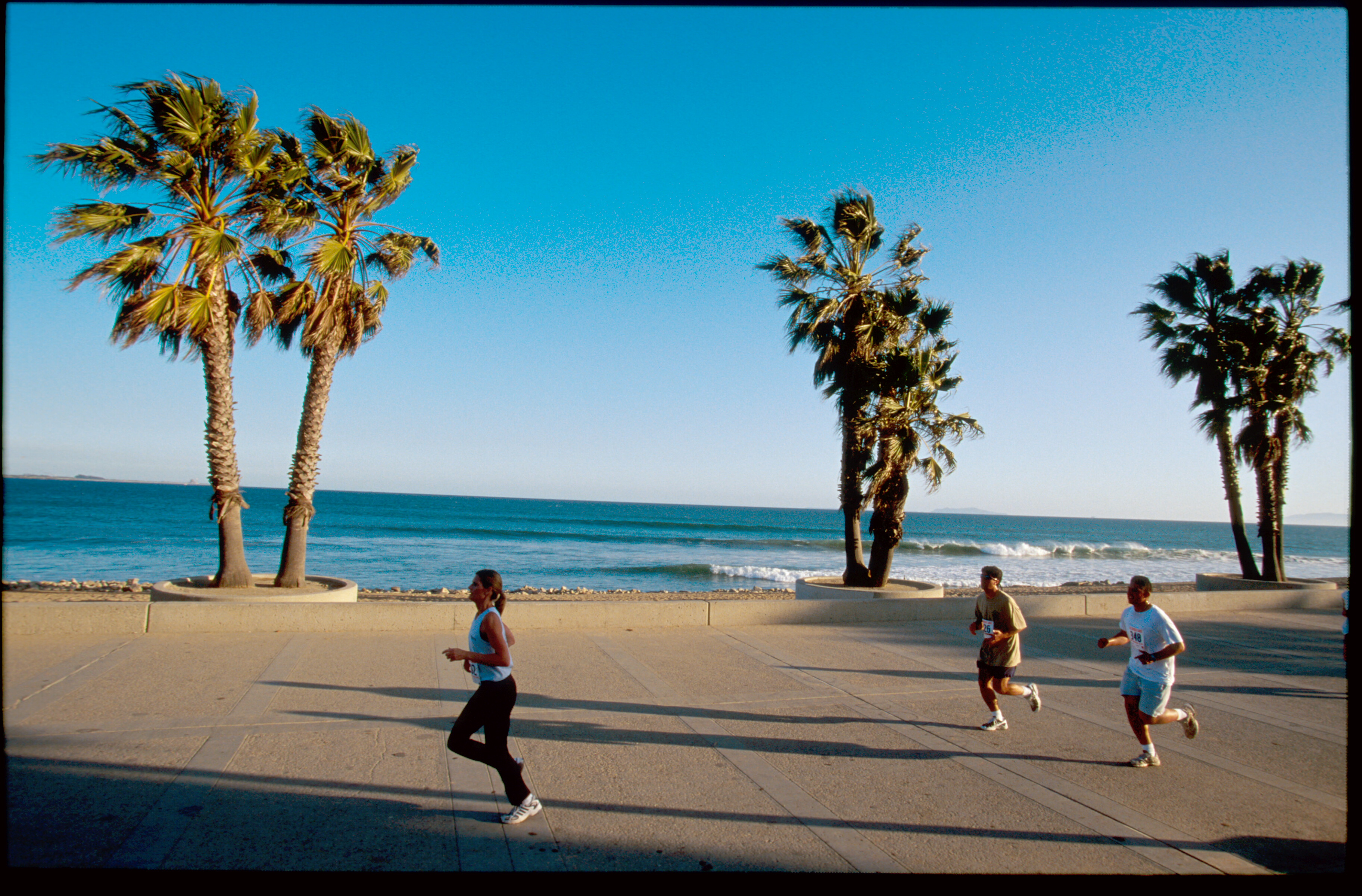 Joggers on Ventura Beach