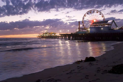 Sunset at Santa Monica Pier in California, from https://www.pacific-coast-highway-travel.com/Santa-Monica-California.html