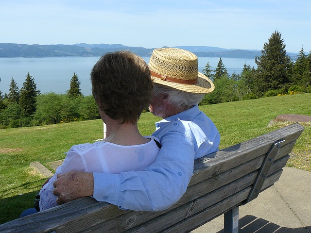 Couple on a park bench in Astoria, Oregon