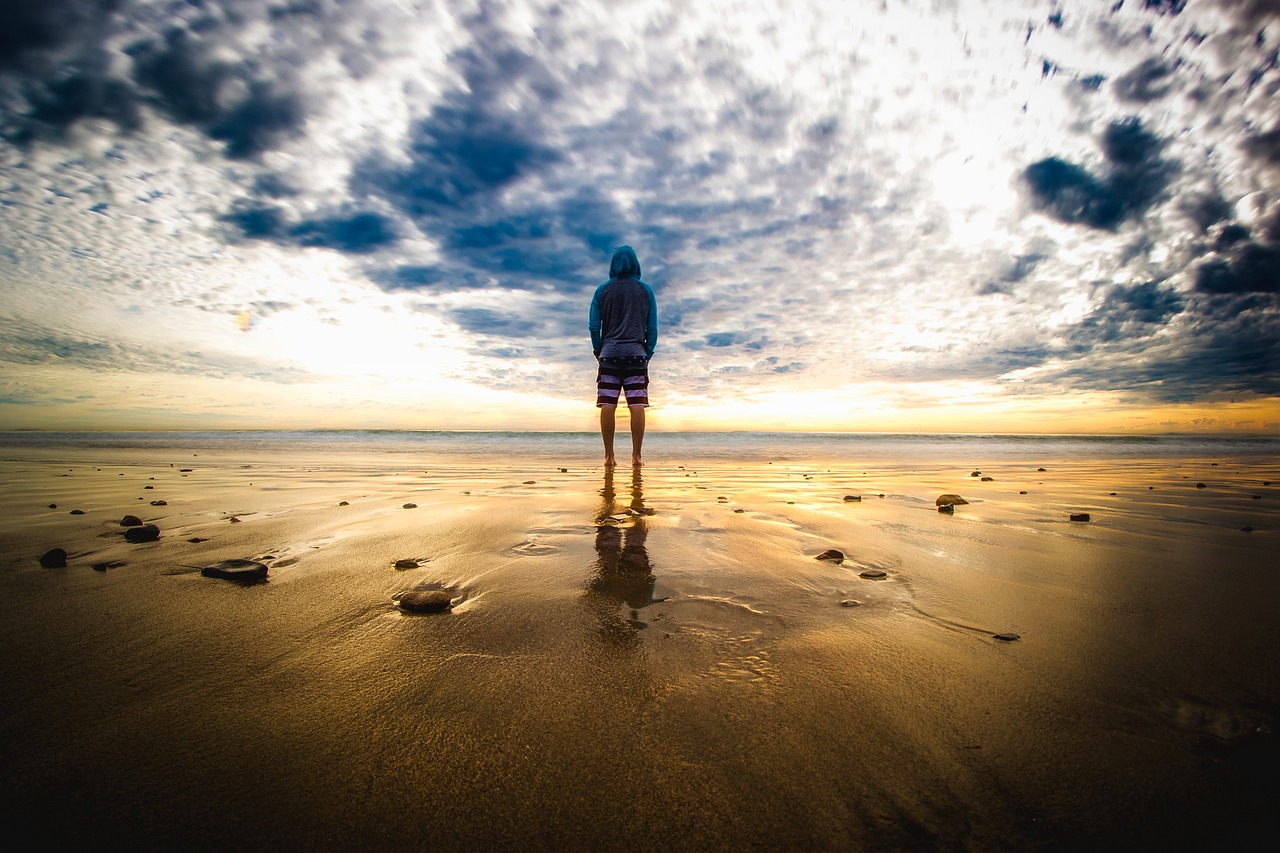 Man on the beach in Malibu, California