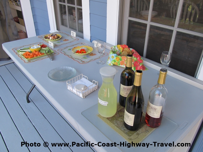 Happy Hour with wine at this Cambria accommodation, the Olallieberry Inn