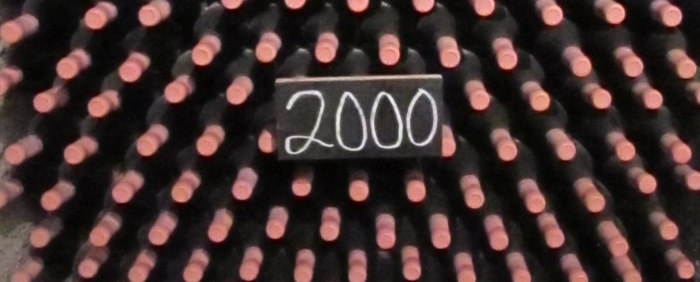 Photograph of wine bottles in a vineyard's cellar on the Pacific Coast Highway in California