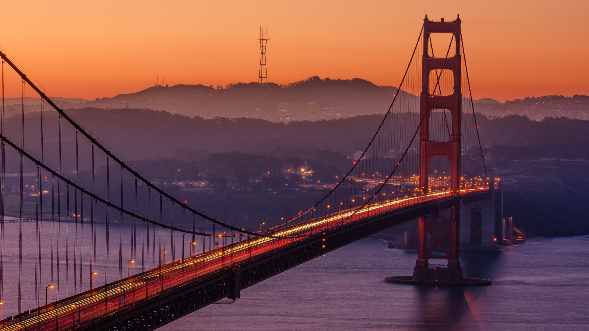 Photo of Golden Gate Bridge in San Francisco with orange sky