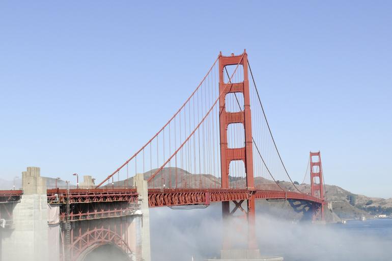 Photo of Golden Gate Bridge in San Francisco on misty water